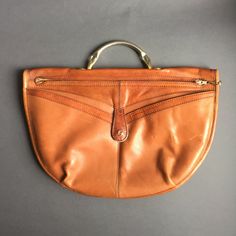 "80s \"Groselj\" famous slovenian designer Handbag ,retro Orange Brown Purse Deep Rich Tan Cognac Leather, Metal Zipper, Womens fashion Bag great vintage condition with scratches on the back, size: 40 x 27 cm Please contact me for any information, especially for custom shipping. similar items you can find under: https://www.etsy.com/shop/RosaBoutiqueStudio?ref=hdr_shop_menu&section_id=20946083 and you can always look into my shop for all the others: https://www.etsy.com/shop/RosaBoutiqueStudio" Retro Crossbody Satchel For Errands, Retro Satchel Shoulder Bag For Errands, Vintage Brown Bag With Zipper For Daily Use, Vintage Brown Bags With Zipper Closure For Daily Use, Retro Crossbody Shoulder Bag For Errands, Vintage Brown Retro Bag For Daily Use, Retro Vintage Brown Bag For Daily Use, Retro Brown Bag With Removable Pouch, Retro Satchel Bag For Errands