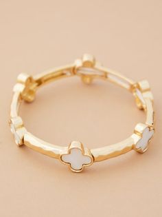 This exquisite stretch bracelet showcases intricate clover motifs, crafted with meticulous detail. A timeless piece for those who appreciate refined beauty and a touch of elegant style. Jewelry Stack, Preppy Jewelry, Clover Bracelet, Stacked Jewelry, Heels & Wedges, Altar'd State, Dream Jewelry, Stretch Bracelet, Stretch Bracelets