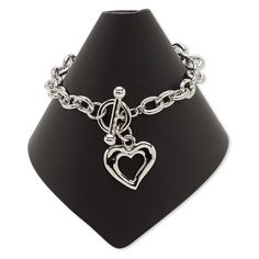 Bracelet features and open heart charm and toggle clasp. Colors, shapes and sizes may vary in each lot. Open Heart, Toggle Clasp, Everyday Jewelry, Heart Charm, Rhodium Plated, Plating, Bracelet, Beads, Silver