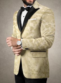 Secure the destination of grandeur by investing in our Italian Silk Almude Tuxedo Suit for your suave collection. Most significantly, the tuxedo suit is crafted from a luxurious blend of silk, cotton, lycra, and jacquard fabric which portrays a thick, comfy feeling while bringing a rugged finish with a minted leafy pattern covered in beige tones. Further, style the classic luxury by fusing supreme tailoring while letting you dictate the sartorial stance to make an exhibition of bold curves with Dapper Dress, Grey Tweed Suit, White Linen Suit, Herringbone Tweed Jacket, Green Velvet Jacket, Peaky Blinders Suit, Royal Blue Suit, Blue Chinos, Beige Tones