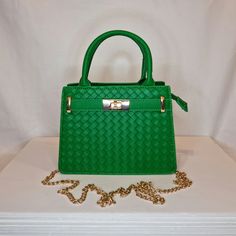 Womens green faux leather woven textured top handle evening clutch bag with gold embellishment, double internal compartments and zip closing top Can be used with or without long shoulder chain (included) size approx- H 14cm x W 20cm Free Royal Mail delivery is an estimated 3-5 days but this can occasionally be slightly longer which solely on the Royal Mail side. We do offer guaranteed next day delivery but please contact us prior to ordering as this would incur a small upgraded shipping charge. We also offer WORLDWIDE shipping - please contact us for more info 💕🌍 Office Crossbody Bag With Braided Handles, Evening Satchel With Braided Handles Crossbody, Trendy Green Crossbody Evening Bag, Gold Shoulder Bag With Braided Handles For Formal Occasions, Formal Gold Shoulder Bag With Braided Handles, Green Crossbody Satchel With Zipper Closure, Green Box Bag With Double Handle For Evening, Party Top Handle Bag With Zipper Closure, Green Clutch Bag With Zipper Closure