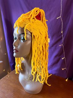 I made this wig for a Janice the Muppet costume a couple of years ago. It has only been worn once and it is one of a kind, for sure. It is made from yellow yarn and each strand was individually pulled through the wig cap one at a time.  This is obviously a very niche wig, but if you are looking to become a muppet for an evening, it will do the trick for sure. More photos of this item, or any item in the shop, available upon request. Also, purchasing pre-loved gifts/items pretty much saves the entire planet. Thanks for clicking and cheers!! Die Muppets, Yellow Yarn, Pull Through, Wig Cap, Adult Costumes, Gift Item, Festival Season, More Photos, Favorite Outfit