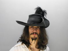 Musketeer (Black) FREE SHIPPING* Pirate Larp, Medieval Cosplay, Feather Centerpieces, Historical Reenactment, Black Costume, Leather Hat, Pirate Hats, Feather Hat, Fancy Hats