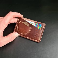 "*Please leave me a note (diameter of your coin) when placing an order If you need a custom size slip for a smaller or bigger coin. The coin used in photos is 38-39mm in diameter. This Minimalist EDC Wallet is fully handcrafted as all of my products. The wallet fits comfortably in your front pocket. The material: The edc card wallet is made of 3-4 oz (1,2-1,6mm) vegetable tanned leather. This durable leather will not only endure but get better with age. The Wallet has: - 2 Card slots that can ca Custom Wallets, Edc Wallet, Air Tag, Wallet With Coin Pocket, Wallet Minimalist, Coin Wallet, Minimalist Wallet, Leather Projects, Money Clip Wallet