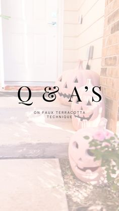 a pink pumpkin sitting on top of a porch next to a brick wall with the words q & a's