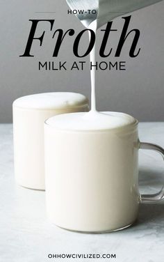 two white mugs filled with milk being poured into one another and the words how to froth milk at home