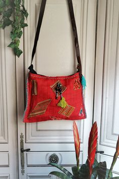 "Vintage Ethnic Shoulder Bag! In Mint condition!! This bag is made by fabric and leather materials. Zipper Working. Lining Black cotton! Measures: 12.6\" x 9.44\" (32 cm x 24 cm) Strap: 44.88\" (114 cm) Thanks for stopping by!!" Handmade Red Satchel Tote, Traditional Red Bag For Everyday Use, Red Embroidered Tote Shoulder Bag, Red Embroidered Travel Bag, Red Leather Handle Pouch Bag, Embroidered Red Tote Bag, Traditional Red Bags For Everyday Use, Traditional Red Bags With Leather Handles, Traditional Red Shoulder Bag For Everyday Use