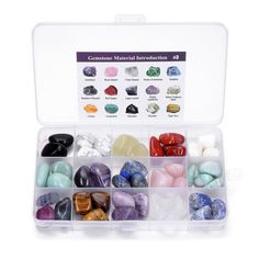 a box filled with lots of different colored rocks