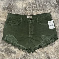 Brand New Never Worn With Tags. Sage Green Free People Denim Shorts Green Summer Bottoms With Frayed Hem, Summer Green Bottoms With Frayed Hem, Green Bottoms With Frayed Hem In Short Length, Casual Green Bottoms With Frayed Hem, Green High Waist Bottoms With Frayed Hem, Green Cutoff Bottoms With Pockets, Trendy Green Denim Shorts, Casual Green Cutoff Jean Shorts, Affordable Green High-waisted Jean Shorts