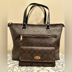 Absolutely Stunning Coach Tote With Matching Wallet. It Is In Excellent Condition, Practically Brand New!There Is A Little Bit Of Wear On Corners And Two Tiny Scuff Marks On One Side (As Shown In Pics), But There Are No Rips, No Stains, & Comes From A Smoke Free But Pet Friendly Home. These Beauties Have Absolutely No Odors Whatsoever. This Stunning Purse Measures At: 12 1/2” Length, 10 1/2” Height, & 5 1/4” Width. The Matching Wallet Measures At: 7 3/4” Length, 4” Height, And 1” Width When Clos Coach Bags With Card Slots For Daily Use, Coach Bags With Card Slots For Travel, Coach Travel Bag With Card Slots, Brown Wallets For Everyday Use, Classic Wallets With Removable Pouch For Shopping, Luxury Brown Shoulder Bag With Card Slots, Luxury Brown Bag With Card Slots, Luxury Brown Bags With Card Slots, Brown Wallets With Interior Card Slots For On-the-go