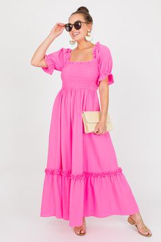 For church, showers, and beyond, this pink maxi is too cute! It features a smocked bodice, a ruffled hem, and side pockets. The short sleeves have a ruffled elastic trim at the shoulders and cuffs. Pink Flutter Sleeve Dress With Smocked Bodice, Spring Pink Smocked Dress With Flutter Sleeve, Pink Dresses With Smocked Bodice And Ruffle Sleeves, Pink Smocked Bodice Dress With Ruffle Sleeves, Pink Maxi Dress With Gathered Sleeves For Spring, Pink Smocked Dress With Ruffle Sleeves, Pink Fitted Smocked Dress With Flutter Sleeves, Pink Summer Maxi Dress With Gathered Sleeves, Pink Maxi Dress With Gathered Sleeves For Summer