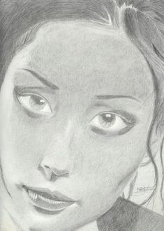 a pencil drawing of a woman's face