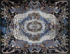 an intricately designed rug with flowers and leaves on black ground, in the middle of a