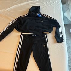 This Cropped Hoody Still Has The Tags On It And Has Never Been Worn. Leggings Have Been Worn Once But In Perfect Condition! Leggings Are Xl But Run Small & Hoody Is L. Can Be Bought Together For Price Listed Or Ask For Individual Pricing. Sporty Hooded Winter Tracksuit, Hooded Winter Tracksuit Sportswear, Winter Hooded Tracksuit Sportswear, Adidas Cotton Activewear For Fall, Winter Sports Tracksuit With Long Sleeves, Casual Winter Hoodie Activewear, Winter Hoodie Sweatshirt For Jogging, Winter Sports Hooded Tracksuit, Winter Hooded Tracksuit For Sports