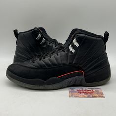 This Air Jordan 12 Utility Grind Black (DC1062-006) is the perfect addition to any sneaker collection. The shoe features a black colorway with a leather upper material, making it durable and stylish. The model is a Men's size 11.5 and is a part of the Air Jordan product line. The sneaker has a unique Style Code (DC1062006) and was released in 2021. It is perfect for athletic activities and is categorized under Men's Shoes and Athletic Shoes. The shoe brand is Jordan and is perfect for sneakerheads looking to add a new pair to their collection. No box Fade-resistant Lace-up Jordan Shoes, Jordan Mid-top Fade-resistant Streetwear Shoes, Casual Leather Basketball Shoes For Streetwear, Custom Fade-resistant Leather Sneakers For Streetwear, Urban Skate Shoes With Fade-resistant Round Toe, Fade-resistant Synthetic Jordan Lace-up Shoes, Jordan Synthetic Streetwear Shoes, Sports Jordan Shoes Fade-resistant, Sports Jordan Shoes Fade-resistant Lace-up