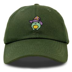 Elevate your spring style with our whimsical Sorcerer Frog Cap, featuring a charming design that adds a touch of magic to any outfit. Crafted for comfort and durability, this cap is perfect for frog enthusiasts and fantasy lovers alike. Discover the perfect blend of style and comfort with our classic dad cap, tailored to fit effortlessly into your everyday wardrobe. This timeless hat features a convenient adjustable slider at the back, ensuring a customizable fit for all head sizes. Designed wit Casual Cotton Halloween Hat, Novelty Green Hats With Curved Brim, Novelty Green Hat With Curved Brim, Green Novelty Baseball Cap, Embroidered Frog, Fall Cap, Cool Dad Hats, Mushroom Frog, Frog Design