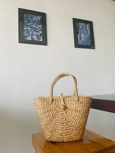 Let's support sustainability! Try our 100% handmade natural bag woven from water hyacinth. It's beautifully designed, durable, and combines style with sustainability. Crafted by skilled local artisans, our bags make a positive impact. Choose conscious fashion for a better future💚 What's special about this bag? * It preserves cultural heritage and local wisdom. * It is made by elderly individuals who want to earn some money during their free time at home. * It is 100% sustainable. * One bag prov Eco-friendly Crochet Bucket Bag With Bamboo Handle, Eco-friendly Crochet Bag With Bamboo Handle, Natural Beach Bag With Bamboo Handle For Everyday Use, Eco-friendly Woven Bucket Bag With Top Handle, Eco-friendly Everyday Straw Bag With Bamboo Handle, Eco-friendly Beach Bag With Bamboo Handle For Daily Use, Eco-friendly Shoulder Bag With Bamboo Handle, Eco-friendly Bags With Bamboo Handle For Vacation, Eco-friendly Bamboo Handle Straw Bag For Daily Use