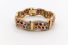 Vintage Chateau D'Argent Gold-Plated Sterling Silver Multi-Gemstone & Cubic Zirconia Bracelet This listing showcases a high-quality vintage 1990s Chateau D'Argent gold-plated sterling silver multi-gemstone & cubic zirconia bracelet. This bracelet, acquired from an estate sale, is in outstanding vintage condition with minimal wear and patina (please refer to the photos for details). The clasp is stamped "C^A 925 CANADA," which is the Chateau D'Argent maker's mark. *This item will be insured becau Multicolor Multi-stone Diamond Bracelet For Formal Occasions, Luxury Gold Diamond Bracelet With Multi-stone, Luxury Diamond Jeweled Bracelets, Luxury Cubic Zirconia Bracelets With Stones, Gold Multi-stone Diamond Bracelet, Gold Diamond Multi-stone Bracelets, Gold Diamond Bracelets With Multi-stones, Anniversary Multi-stone Cubic Zirconia Tennis Bracelet, Gold Cubic Zirconia Bracelet With Gemstone Accents