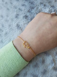 "Dainty Elephant Bracelet Bracelet Width: 3/8\" (0.9 cm) widest part  Chain Length: 6 1/4\" (16.0 cm) + 1 1/2 \" Extension (3.5 cm) Chain Width: 0.1 cm Chain Extension: Yes Clasp: Yes Type of Clasp: Lobster Claw Weight: 2g Metal: Rhodium or 14k gold plated, Brass, Tarnish resistant Material: N/A" Cute Adjustable Gold Jewelry, Nickel Free Bangle Chain Bracelet For Gifts, Nickel Free Bangle Name Bracelet Gift, Nickel Free Bangle Name Bracelet For Gift, Adjustable Gold Bangle Bracelet As Gift, Adjustable Gold Bangle Bracelet Gift, Nickel-free Bangle Name Bracelet For Gift, Adjustable Heart Bangle Bracelet For Gift, Dainty Gold Bangle Bracelet For Gift