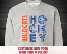 a gray sweatshirt with the words, customize with your team name and colors