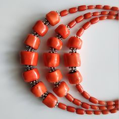 < Orange coral beaded necklace > This product made according to the model of authentic traditional Ukrainian jewelry. The coral is modern, the design is vintage. Like 99% of the coral on the market these days, this coral has been dyed. I use bamboo coral which is not endangered or threatened in any way, unlike natural pink or red coral (the production of which is forbidden almost everywhere in the world). Bamboo coral doesn't mean it's not organic. Every bead of it has a distinctive and be Ukrainian Jewelry, Fashion Traditional, Coral Beads Necklace, Bamboo Coral, Ethnic Necklaces, Orange Coral, Natural Coral, Coral Necklace, Coral Jewelry