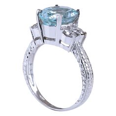 Stamped: 14K White Gold Total Ring Weight: 4.5 Grams Ring Length: N/ARing Width: N/A Gemstone Weight: Total Natural Aquamarine Weight is 3.33 Carat (Measures: 11.10x8.95 mm) Color: Blue Diamond Weight: Total Natural Diamond Weight is 0.70 Carat Quantity: 4 Color: F-G, Clarity: VS2-SI1 Face Measures: 11.10x13.70 mm Sku: [702101W] Luxury Three Stone Gemstones For Anniversary, Luxury Marquise Ring With Accent Stones, Luxury Marquise Rings With Accent Stones, Luxury Rings With Marquise Accent Stones, Gia Certified Oval Blue Topaz Ring, Gia Certified Oval Topaz Ring For Formal Occasions, Luxury Marquise Cut Ring With Accent Stones, Oval Gia Certified Topaz Ring For Formal Occasions, Formal Oval Topaz Ring Gia Certified