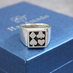 Silver Poker Ring is handmade with its own uniqueness. It can be bought as a gift for any occasion like birthday gift, wedding gift, travel gift, souvenir and etc. If you need rose gold plating or yellow gold plating, please contact us, we will advice you on the additional fees applicable. Great gift for gambler and poker player. Base Material: Sterling Silver Depth Size: 10mm x 10mm (Approximately) Ring Size: US 4 - US 14 (Please select your size) Metal Stamped: 925 Themes: Poker Style: Signet Symbolic Heart Shaped Rings As Gifts, Symbolic Stamped Rings As Gift, Custom Handmade Rings As Gifts, Symbolic Stamped Rings For Gifts, Unique Stamped Rings As Gift, Unique Stamped Rings For Gifts, Silver Heart Shaped Signet Ring Gift, Silver Signet Ring For Valentine's Day Gift, Rectangular Stamped 925 Signet Ring As Gift