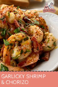 garlic shrimp and chorizo on a white plate with text overlay that reads garlic shrimp and chorizo