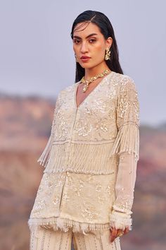 This stunning ivory cord set in georgette features meticulous embroidery and beautiful long tassel detailing on both the palazzo and blouse. Palazzo And Blouse, Personal Shopping Service, Cord Set, Tailored Design, Indian Design, Designer Wear, Embroidered Blouse, Handmade Clothes, Last Minute Gifts