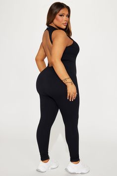 Available In Black, Charcoal, And Sand. Active Jumpsuit Seamless Ribbed Crew Neck Sleeveless Back Cut Out Skinny Leg Stretch 92% Nylon 8% Elastane Imported | Effortless Kim Ribbed Seamless Jumpsuit in Black size Large by Fashion Nova Seamless Jumpsuit, Leg Stretching, Black Jumpsuit, Black Charcoal, Fashion Nova, Black Fashion, Cut Out, Jumpsuit, Size Medium