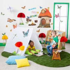 two children are sitting in their play tents