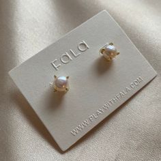 Dive into timeless elegance with our 18k gold-plated pearl stud earrings. These freshwater pearl stud earrings make for an elegant addition to any outfit. Classic jewelry vibe combined with the fashion-forward trend. Whether for a special occasion or everyday wear, these dainty studs add a touch of refined beauty to any ensemble. Elevate your style with these classic pearl studs that effortlessly capture the essence of elegance and grace DETAILS *18K Gold Plated  * 925 Sterling Silver * Freshwater Pearls MEASURES Pearl length: 6.2mm (The freshwater pearls are approx, We'll make sure the pearls used complement each other well) Sell as a pair MORE Styles https://www.etsy.com/your/shops/FalaJewelry/tools/listings/643609618 PACKAGE: All jewelry comes in beautiful packaging, gift ready. ABOUT F Minimalist Tarnish-resistant Pearl Earrings As Gift, Dainty Tarnish-resistant Pearl Earrings For Anniversary, Dainty Tarnish Resistant Pearl Earrings For Anniversary, Minimalist White Gold-plated Pearl Earrings, Minimalist White Gold Plated Pearl Earrings, White Gold Plated Minimalist Pearl Earrings, Everyday Fine Jewelry Pearl Earrings, Classic Gold Plated Pearl Earrings, Tarnish Resistant, Classic Tarnish Resistant Pearl Earrings For Gift