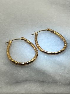 "Vintage estate 14K rose gold diamond cut oval hoop style earrings. The earrings weigh .92g and measure 25mm long (1 \"). They are 2mm wide. Posts are stamped 14K with ZRW maker's mark for Jewel America. Earrings were tested at auction and I re-tested on my Gemoro AuRacle AGT3." Gold Diamond Cut Oval Hoop Earrings, Gold Oval Diamond Cut Hoop Earrings, Oval Gold Hoop Earrings With Diamond Cut, Hammered Yellow Gold Oval Earrings, Yellow Gold Oval Hammered Earrings, Rose Gold Hammered Small Hoop Earrings, Hammered Oval Earrings For Anniversary, Oval Hammered Earrings For Anniversary, Elegant Hammered Rose Gold Hoop Earrings