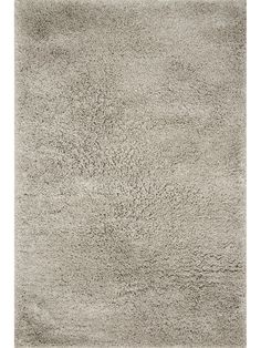 an area rug that is very soft and shaggy with no pattern on the top, it has