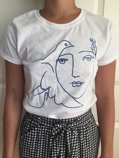 A beautiful hand-screenprinted t shirt featuring Picassos simple line drawing. (these shirts are pre-shrunk so they wont shrink in the dryer) Please let me know if you have any questions or requests, Id be happy to help! ***for a more form fitting shirt, order a womens size; for a looser fit, Picasso Dove, Woman T Shirt, Simple Line Drawings, Gifts For Art Lovers, Bella Canvas Tees, Lovely Clothes, Print Tee, Art Lovers, Printed Tees