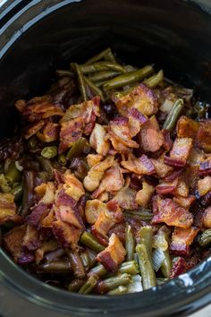 bacon and green beans in the crock pot ready to be cooked for lunch or dinner