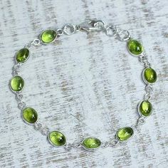 Peridot and Sterling Silver Link Bracelet from India - Elegant | NOVICA Cheap Silver Rings, Buying Gold, Gold And Silver Bracelets, Silver Link Bracelet, Jewelry Bracelets Silver, August Birthstone, Handcrafted Bracelets, Elegant Bracelet, Sterling Silver Dangle Earrings