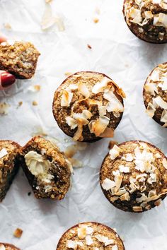 the muffins have been topped with coconut flakes