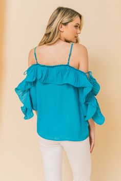 This cute lopez turquoise cold shoulder ruffled pleat top is perfect for your favorite looks! Featuring a ruffled pleat design, sleeveless and tie in. Ruffled pleat design Cold shoulder Sleeveless Turquoise print Fabric: 100% Polyester Turquoise Print, Pleat Top, Print Fabric, Cold Shoulder, Printing On Fabric, Open Shoulder Tops, Ruffle Blouse, Turquoise, Women's Top