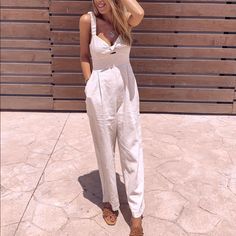 Cotton Chic Linen Jumpsuits And Rompers For Day Out, Chic Overall Bottoms For Vacation, Chic Linen Jumpsuits And Rompers For Summer, Chic Vacation Overalls, Fitted Overalls For Beach, Fitted Beach Overalls, High Waist Solid Jumpsuits And Rompers For Summer, High-waist Jumpsuits And Rompers With Pockets For Beach, High Waist Jumpsuits And Rompers With Pockets For Beach