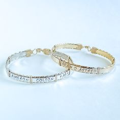 These personalized bracelets are made with .925 sterling silver and high quality 14kt gold-filled wire, making them perfect for everyday wear. With the ability to be personalized with names, dates, astrology signs, paw prints, or even a baby foot symbol, these bracelets can be custom-made to fit any occasion. Mothers and grandmothers love be able to sport children and grandchildren's names, and couples are able to easily fit both names and an anniversary date. Up to seven names generally fit( varies by size and length-of-name, please contact us for specific questions you may have). Nickel-free Gold Name Bracelet For Everyday, Adjustable Nickel-free Name Bracelet For Everyday, Adjustable Hand Stamped Sterling Silver Bracelet, Everyday Spiritual Engraved Bracelets, Adjustable Engraved Name Bracelet In Sterling Silver, Personalized Adjustable Sterling Silver Bracelet, Adjustable Sterling Silver Name Bracelet With Engraving, Adjustable Sterling Silver Name Bracelet Engraved, Silver Hand Stamped Name Bracelet For Anniversary