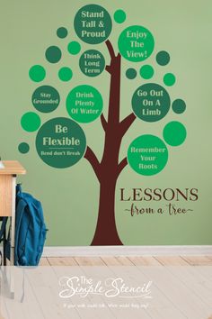 This easy to install vinyl wall art of "Lessons from a tree" adds a colorful element to the walls of a school classroom. The inspirational messages read: Stand tall and proud. Enjoy the view. Think Long Term. Go out on a limb. Stay grounded. Drink plenty of water. Be Flexible. Bend, don't break. Remember your roots. Shown with chocolate brown tree trunk and lime green and forest green polka dot circles that can be placed as desired during install in any creative pattern. Sized 48" x 60" as shown Wall Transfers, Educational Decor, Motivate Students, Tree Decal, Wall Tree, School Hallways, Out On A Limb, Counseling Office, Tree Decals