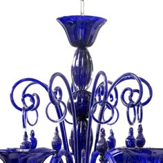 a blue glass chandelier is shown against a white background