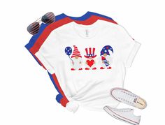 Show your patriotism with this cute 4th of July Gnomes shirt. This patriotic shirt is perfect for celebrating Independence Day, Memorial Day or just showing your loyalty.  Our Bella Tees are like finding a treasure at the end of a rainbow. Our shirts are super soft and become softer with each wash! ✿PLEASE SEE THE SIZING CHARTS for the measurements, and please consider comparing those measurements to a shirt that currently fits well. ✿Current production time is 3-5 business day. This is subject to change based on current order volume. If you need your order by a specific date please let us know before placing your order to make sure we can accommodate. Add RUSH MY ORDER upgrade your processing time to 1-2 business days. https://www.etsy.com/listing/578905255/rush-my-order-add-rush-for-fast Patriotic American Flag Shirt For Veterans Day, Patriotic American Flag Shirt For Labor Day, Patriotic American Flag Shirt For Memorial Day, Patriotic Pre-shrunk Shirt For 4th Of July, Patriotic Shirt With Flag Print For Labor Day, Patriotic Flag Print Shirt For Labor Day, Patriotic Flag Print Shirt For 4th Of July, Patriotic Shirt With Flag Print For 4th Of July, Patriotic Shirt With American Flag Print For Independence Day