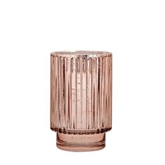 a pink glass candle holder on a white background