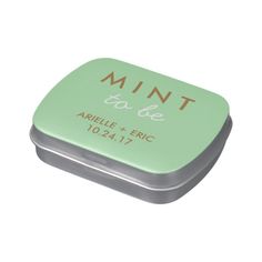 mint tin with wedding date printed on it