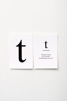 two business cards with the letter t on them