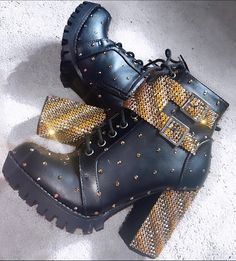 Tudor Queendom Costume Boots (Inspired by Six The Musical) Custom designs available!  Example boots are for the character of Catherine of Aragon. Catherine of Aragon boots include the colour's Bronze, Gold and Rose Gold. Shoe size, heel height, colours and gem types (e.g. standard rhinestones or Swarovski) can all be made to order and if you wish to have your own pair customised this can be arranged, this price includes the double rhinestoned buckle. Contact me with any questions or queries and I've be happy to do them. All made with non-toxic and washable glue.  Please not the dispatch time when you order - if you need them more urgently please send me a message. *Not official merchandise and the designs from the show will not be copied * The price stated is to cover material and labour c Catherine Of Aragon Costume, Trendy High Heel Boots With Rivets, Trendy High Ankle Boots With Rivets, High Heel Moto Boots With Rivets For Party, Spiked Moto Boots With Round Toe For Party, Party Moto Boots With Spikes And Round Toe, Party Moto Boots With Rivets And Round Toe, Spiked Moto Boots For Party, Six The Musical Boots