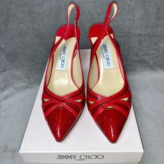 Jimmy Choo Diva Slingback Heels. The Vamp Features Cutout Details. Upper Material Is Red Water Snakeskin And Red Kid Leather. Original Box And Dust Bag Included. Color: Red Size: 6.5 Us, 36.5 Eu Slingback Heel Upper: Watersnake And Kid Leather Heel Height: 3 Inches Dust Bag Original Box Made In Italy Condition: Excellent Used Condition. Worn A Few Times Indoors. Never Worn Outdoors. No Stains Or Scuffs On The Leather Upper, Inner Sole Or Heel. Minimal Signs Of Wear On The Bottom Sole And Heel Ca Designer Slingback Pumps With Red Sole, Elegant Red Slingback Pumps With 4-inch Heel, Red Slingback Pumps With 4-inch Heel, Luxury Leather Slingback Pumps With Red Sole, Luxury Slingback Pumps With Red Sole And Ankle Strap, Luxury Ankle Strap Slingback Pumps With Red Sole, Evening Slingback Pumps With Red Sole, Red Slingback Pumps With Padded Heel For Evening, Designer Slingback Pumps With Red Sole For Formal Occasions