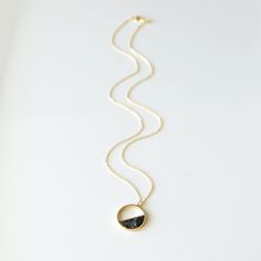 "Beautiful and lovely circle pendant necklace made of half-circle black marble stone gold circle pendant with skinny gold chain. Soft and warm. Great for gift, everyday or special occasion. Your item will ship in a gift box. Please feel free to contact me if you have any questions. ♥ Length available 15\" - 24\" ♥ Circle pendant 7/8\" ♥ Gold plated over brass / Black marble stone ♥ Delivery Time Fast shipping within 1 - 3 days ♥ See more Rudiana Accessories Rudiana.etsy.com" Black Round Pendant Necklace For Everyday, Black Round Necklace For Everyday, Everyday Black Round Pendant Necklace, Everyday Black Round Necklace, Everyday Black Round Necklaces, Minimalist Black Circular Jewelry, Minimalist Black Circle Jewelry, Black Round Necklace For Her, Black Necklace Gift For Her